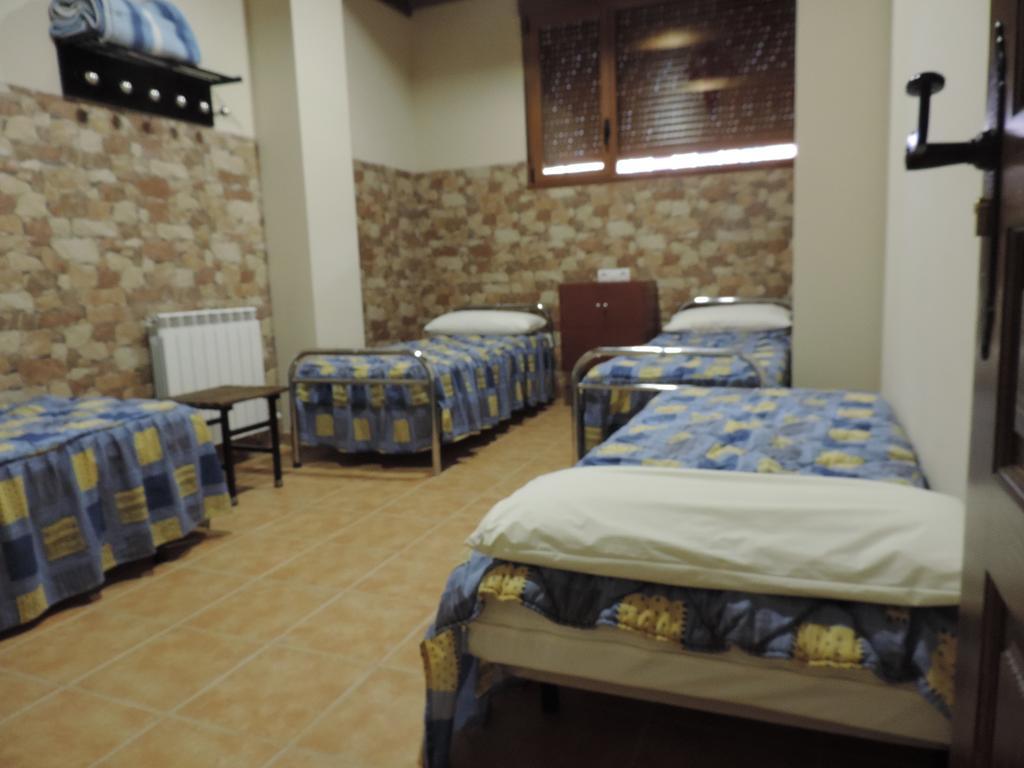 Habitación Cuádruple Económica con baño compartido